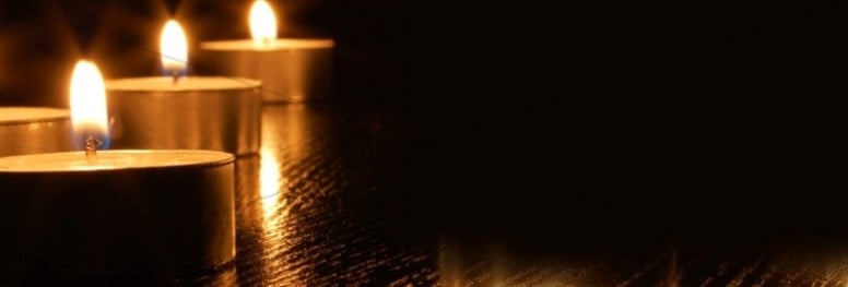 Lit candles banner